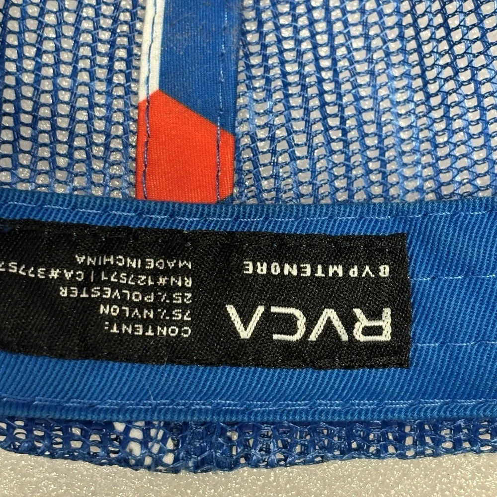 RVCA foam trucker hat featuring a blue crown, red brim, and red mesh back